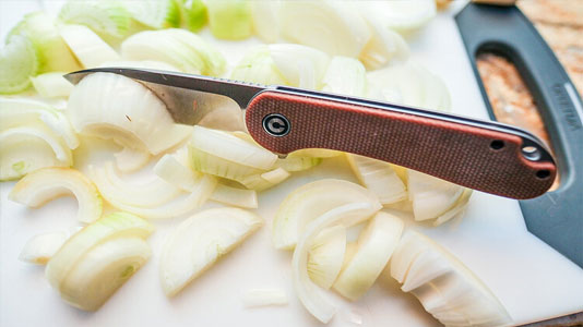 civivi Elementum knife cutting onions
